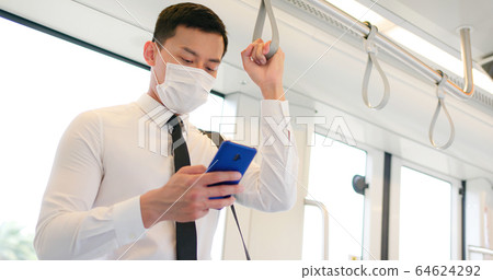 man with mask in metro man with mask in metro 64624292