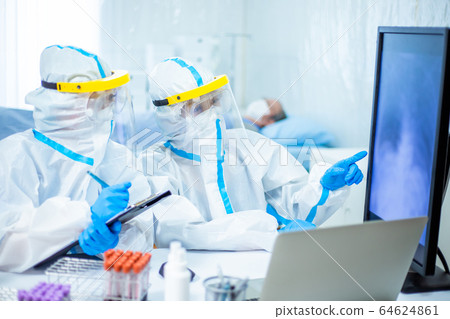 Doctors Studying A Chest X-Ray 64624861