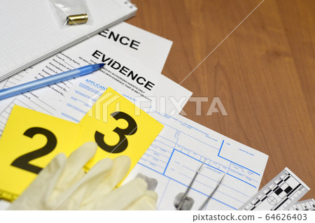 Paperwork during crime scene investigation process Paperwork during crime scene investigation process 64626403