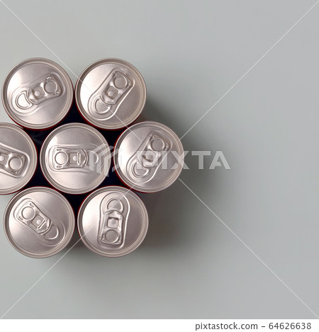 Many new aluminium cans of soda soft drink or 64626638