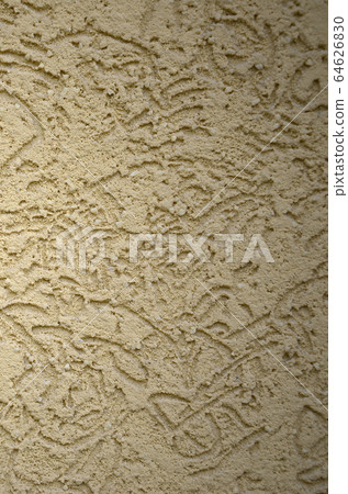 The texture of the beige decorative plaster in 64626830
