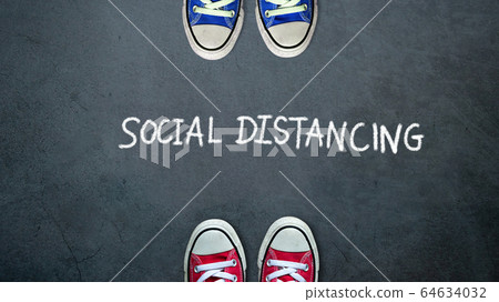 Social distancing. two people keep spaced between each other for social distance, increasing the physical space between people to avoid spreading illness during transmission of COVID-19 outbreak 64634032