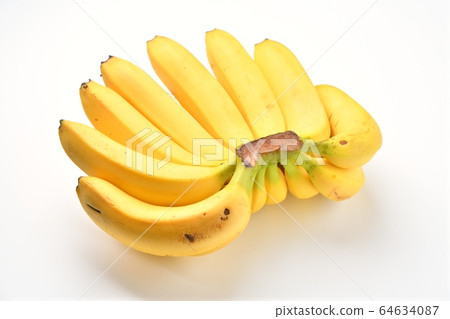 A large bunch of bananas. A lot of bananas. A large bunch of bananas. A lot of bananas. 64634087