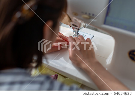 Handmade handmade women using sewing machines Handmade handmade women using sewing machines 64634623