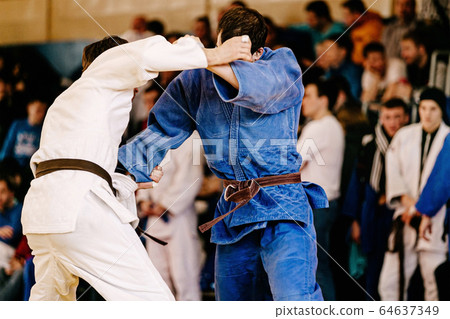 fight judokas on judo competition 64637349