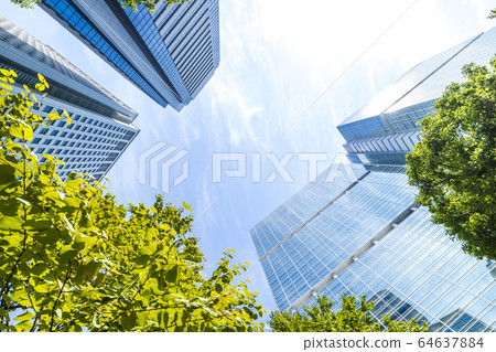 Landscape of the office town looking up at a skyscraper 64637884