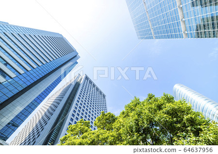 Landscape of the office town looking up at a skyscraper 64637956