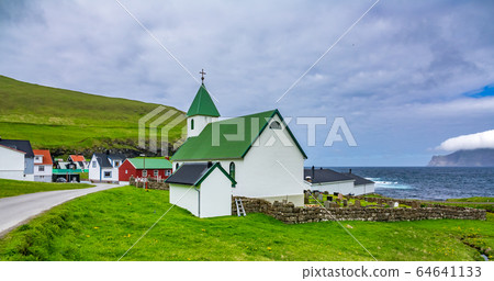 Gjov church and houses in Faroe Islands 64641133