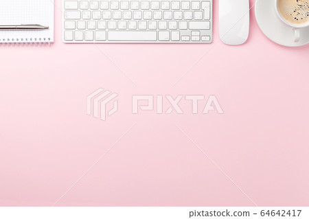 Pink workplace with computer, notepad and coffee Pink workplace with computer, notepad and coffee 64642417
