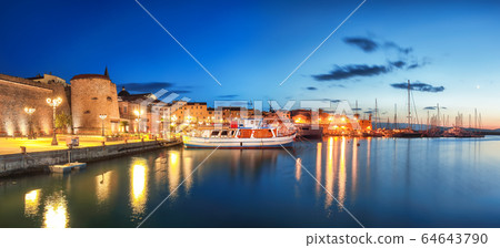 Night view of the Alghero Marina yacht port at the Night view of the Alghero Marina yacht port at the 64643790