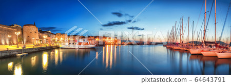 Night view of the Alghero Marina yacht port at the Night view of the Alghero Marina yacht port at the 64643791