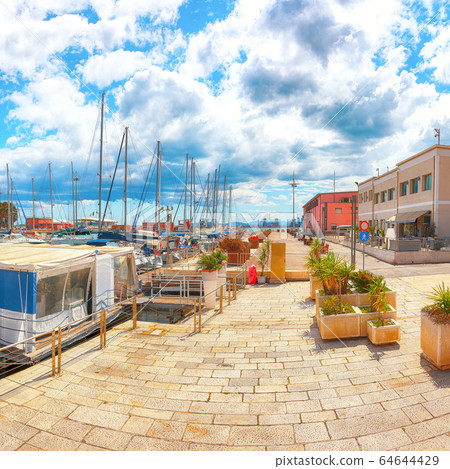 Splendid spring Cityscape with marina and Yachts 64644429