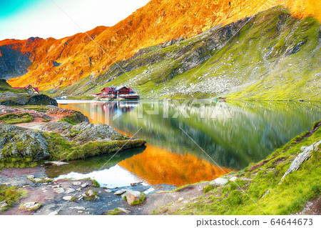 Majestic sunset view of Balea glacier lake near 64644673