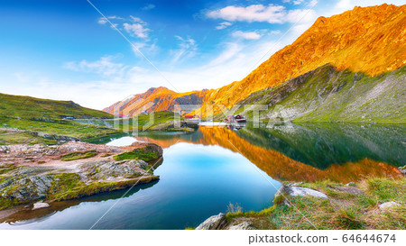 Majestic sunset view of Balea glacier lake near Majestic sunset view of Balea glacier lake near 64644674