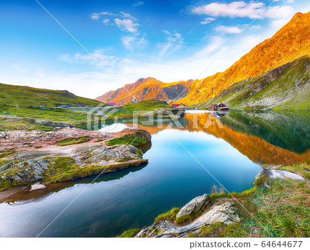 Majestic sunset view of Balea glacier lake near Majestic sunset view of Balea glacier lake near 64644677