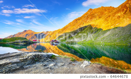 Majestic sunset view of Balea glacier lake near 64644678