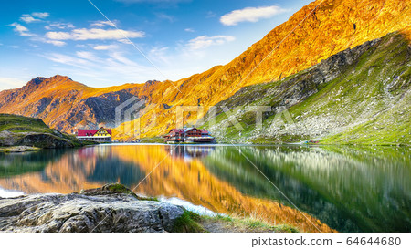 Majestic sunset view of Balea glacier lake near Majestic sunset view of Balea glacier lake near 64644680