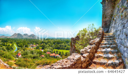 Aerial sunny morning view of valley of Moraca 64645427