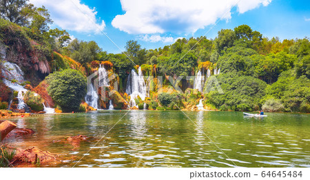 Picturesque Kravice waterfalls in the National Picturesque Kravice waterfalls in the National 64645484