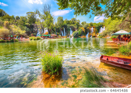Picturesque Kravice waterfalls in the National Picturesque Kravice waterfalls in the National 64645486