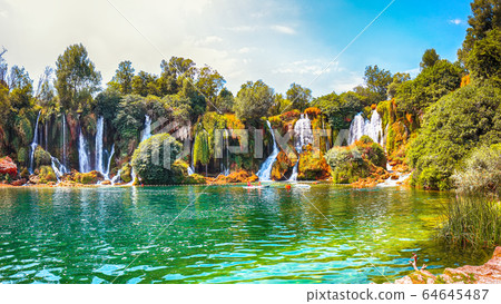 Picturesque Kravice waterfalls in the National Picturesque Kravice waterfalls in the National 64645487