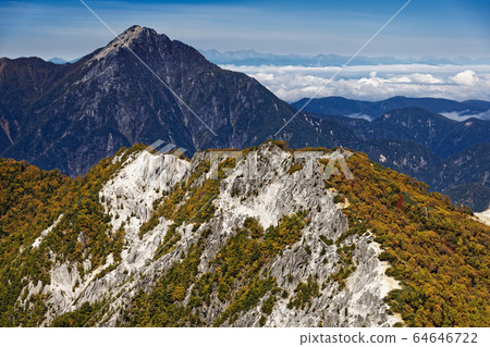 Kai Komagatake, the Northern Alps and the autumnal ridge seen from Mt. Fenghuang and Mt. Kannon 64646722