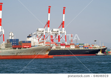 Scenery of container cargo ship loading and unloading at Port of Nagoya Scenery of container cargo ship loading and unloading at Port of Nagoya 64646919