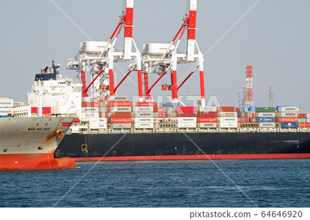 Scenery of container cargo ship loading and unloading at Port of Nagoya Scenery of container cargo ship loading and unloading at Port of Nagoya 64646920