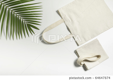 White tote bag canvas fabric. Cloth shopping sack 64647874