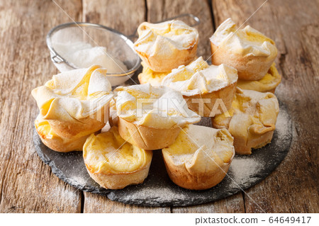 Tasty Italian Soffioni cake with ricotta cheese Tasty Italian Soffioni cake with ricotta cheese 64649417
