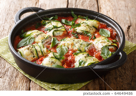 Zucchini rolls baked recipe with ricotta cheese Zucchini rolls baked recipe with ricotta cheese 64649486