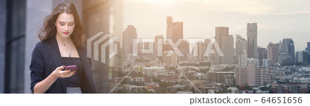 Double exposure cityscape with business women using smartphone. Double exposure cityscape with business women using smartphone. 64651656