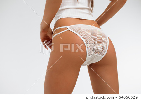 Faceless seductive lady touching lingerie in 64656529