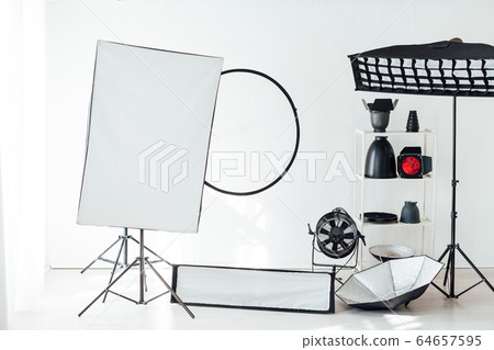 Photo studio equipment accessories photographer flashes red filter Photo studio equipment accessories photographer flashes red filter 64657595
