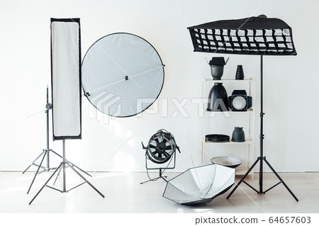 Photo studio accessories photographer flash white room Photo studio accessories photographer flash white room 64657603