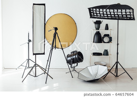 Photo studio accessories photographer flash white room Photo studio accessories photographer flash white room 64657604