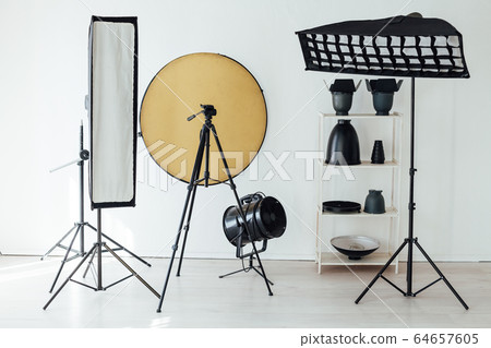 Photo studio accessories photographer flash white room Photo studio accessories photographer flash white room 64657605