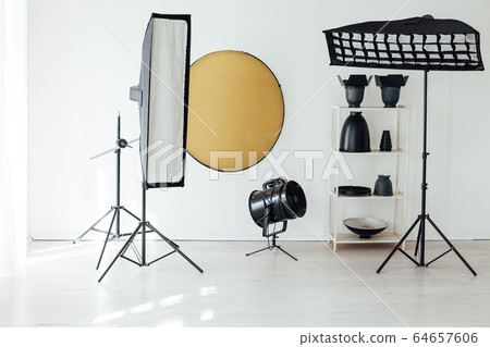 Photo studio accessories photographer flash white room Photo studio accessories photographer flash white room 64657606