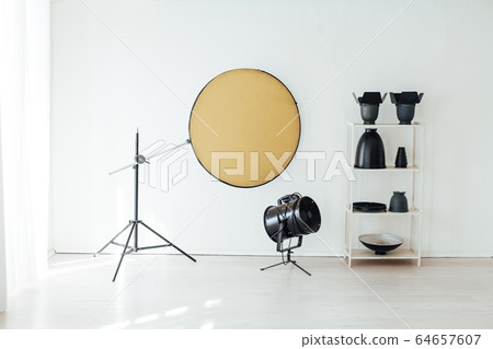 Photo studio accessories photographer flash white room Photo studio accessories photographer flash white room 64657607