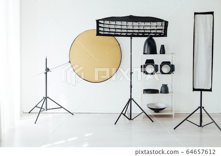 Photo studio accessories photographer flash white room Photo studio accessories photographer flash white room 64657612