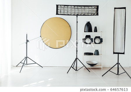 Photo studio accessories photographer flash white room Photo studio accessories photographer flash white room 64657613