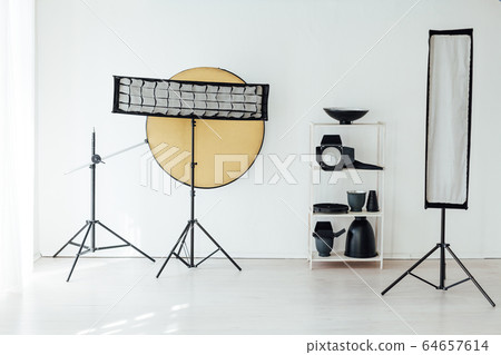 Photo studio accessories photographer flash white room Photo studio accessories photographer flash white room 64657614