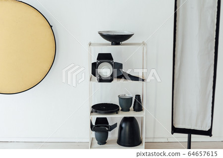 Photo studio accessories photographer flash white room Photo studio accessories photographer flash white room 64657615
