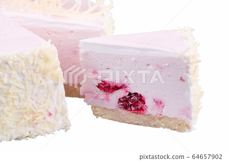 Piece of air cream cake with white chocolate chips Piece of air cream cake with white chocolate chips 64657902