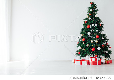 Christmas tree with gifts of the new year internet white room 64658990