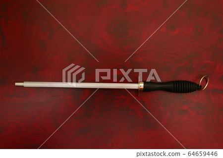 Knife Sharpener On A Cutting Board Knife Sharpener On A Cutting Board 64659446