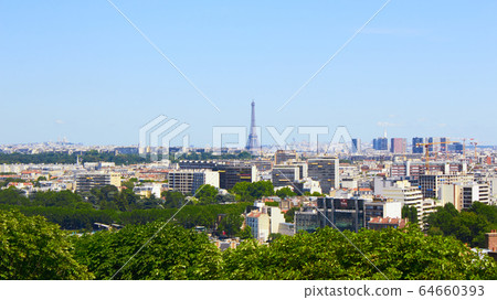 Paris, France - August 26, 2019: Paris from above showcasing the capital city's rooftops, the Eiffel Tower, Paris tree-lined avenues with their haussmannian buildings and Montparnasse tower. 16th Paris, France - August 26, 2019: Paris from above showcasing the capital city's rooftops, the Eiffel Tower, Paris tree-lined avenues with their haussmannian buildings and Montparnasse tower. 16th 64660393