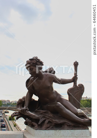 Sculpture detail on Pont Alexandre III bridge in Paris France 64660451