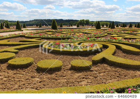 The Parterre du Midi garden in the Palace of Versailles, France. The Palace of Versailles is on the UNESCO World Heritage List. The Parterre du Midi garden in the Palace of Versailles, France. The Palace of Versailles is on the UNESCO World Heritage List. 64660489