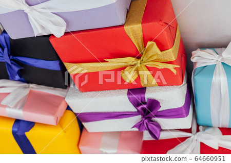 lots of different holiday gifts on a grey background lots of different holiday gifts on a grey background 64660951